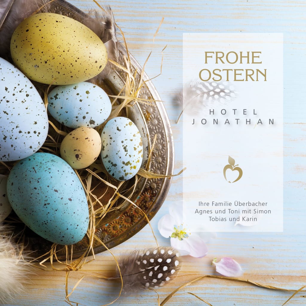 Bunte Ostereier in einem Korb mit Text Frohe Ostern und Hotel Jonathan